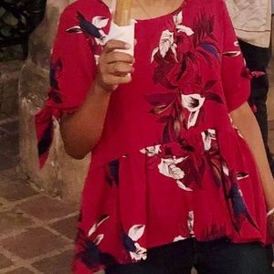 Red floral blouse
